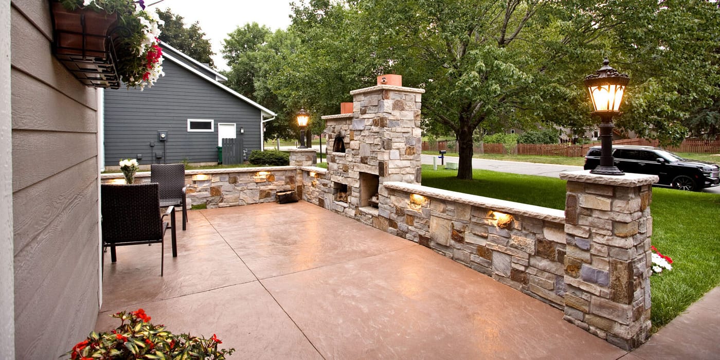 Rustic, Walled Outdoor Kitchen That Faces the Front